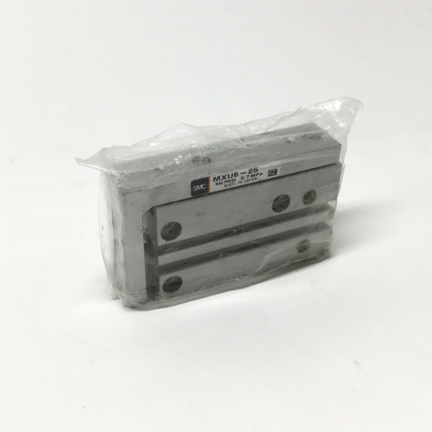 New – Open box SMC MXU6-25 Compact Air Slide Table, Ø6mm Bore, 25mm Stroke, 0.7MPa, M5 Ports