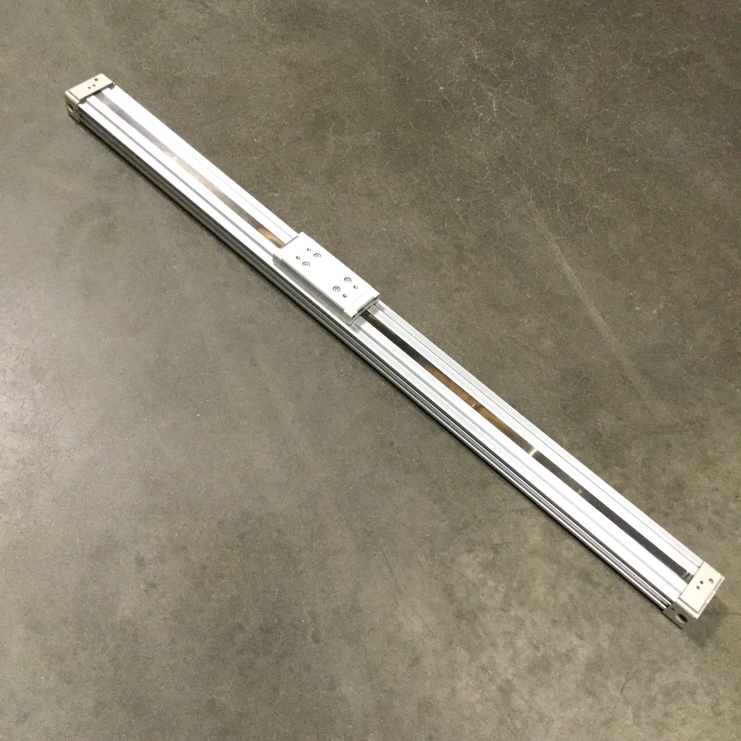 Used Parker P1XN032DAN0813B-B Rodless Cylinder, 32mm Bore, 813mm Stroke, 1/4" NPT