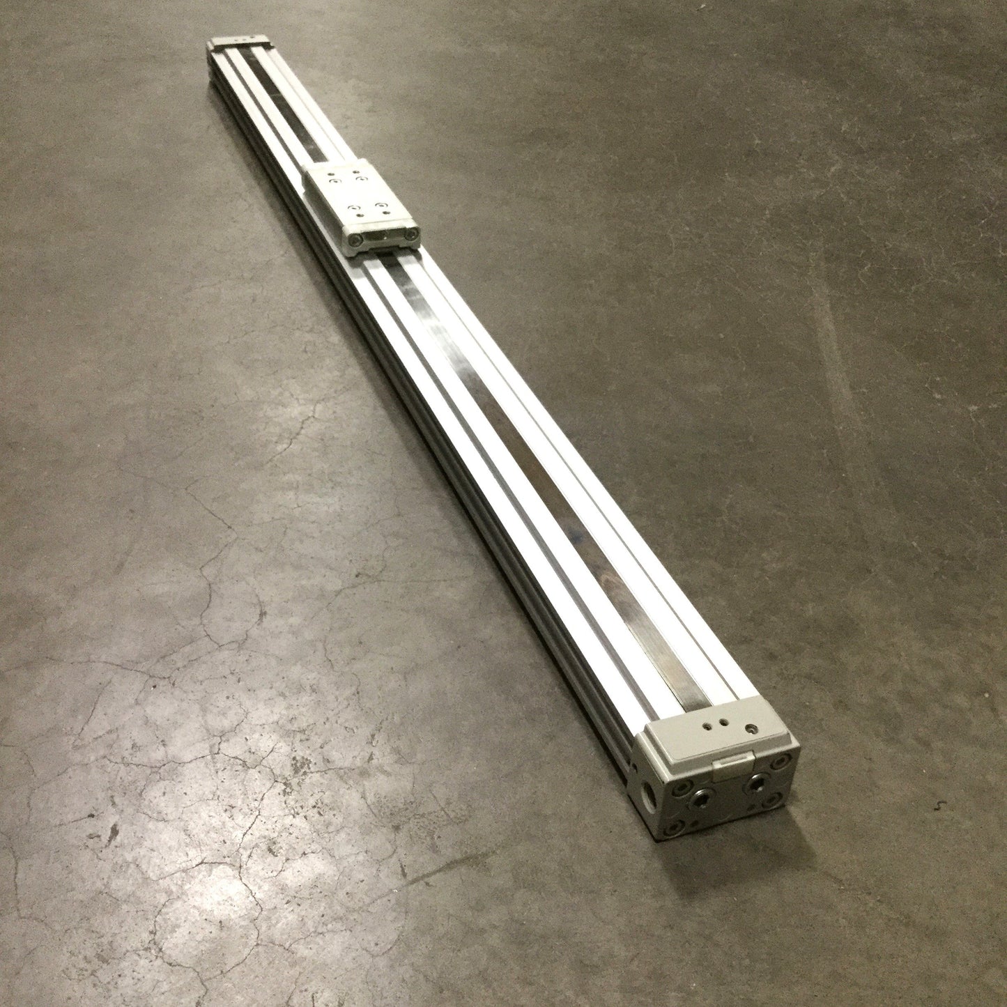 Used Parker P1XN032DAN0813B-B Rodless Cylinder, 32mm Bore, 813mm Stroke, 1/4" NPT