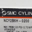 Used SMC NCY2B6H-0200 Rodless Guided Cylinder, ø6mm Bore, 50mm Stroke, #10-32, 100psi