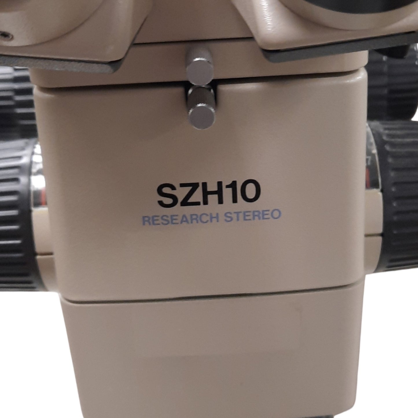 Used Olympus SZH10 Stereo Microscope With Leeds Base, 0.7x to 7x Mag, 120-240VAC