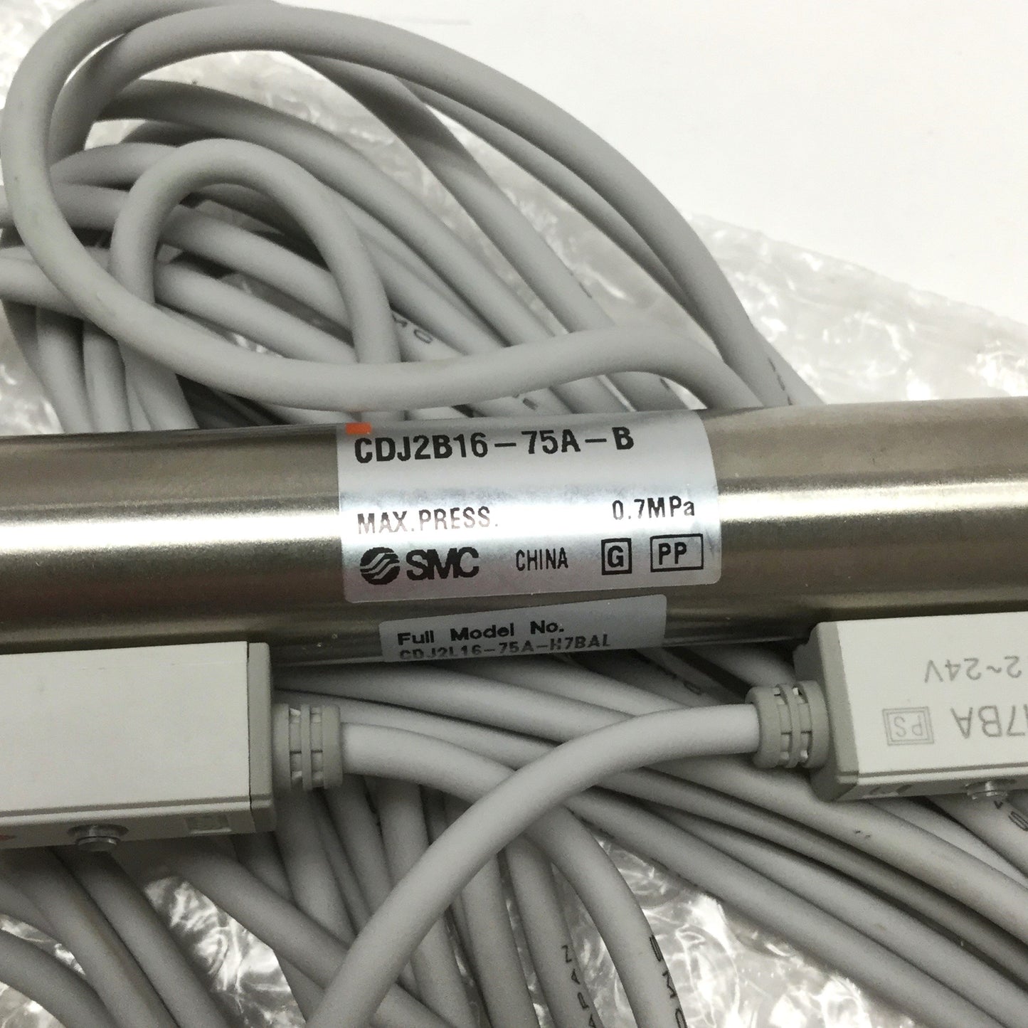 New – Open box SMC CDJ2L16-75A-H7BAL Air Cylinder, Ø16mm Bore, 75mm Stroke w/Auto Switches