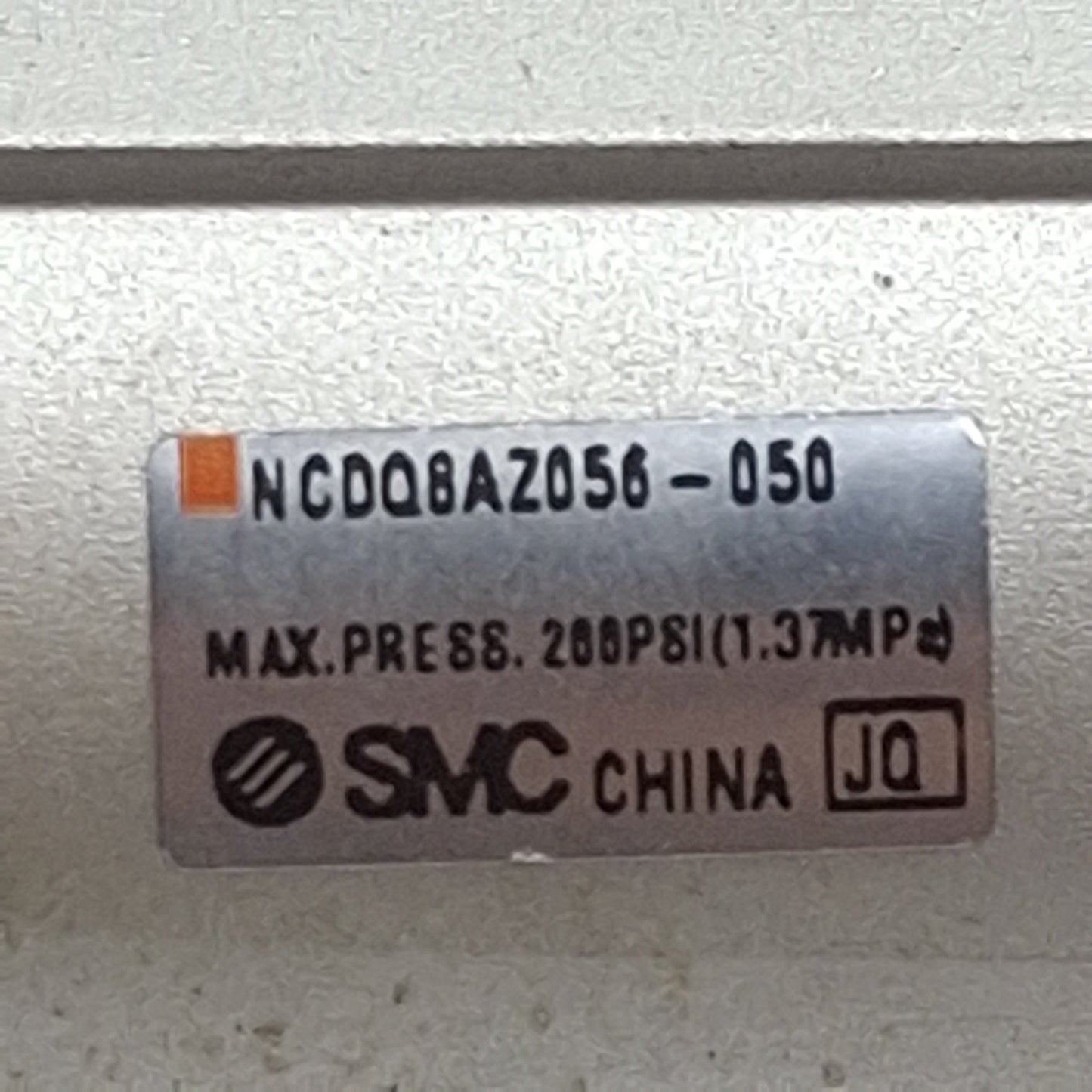 Used SMC NCDQ8AZ056-050 Compact Cylinder, ø9/16in Bore, 1/2in Stroke, #10-32, 200psi