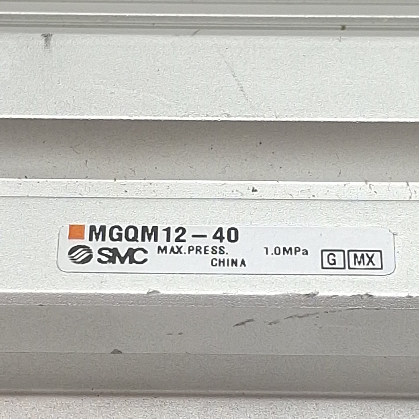 Used SMC MGQM12-40 Compact Guided Cylinder, ø12mm Bore, 40mm Stroke, M5 x 0.8, 1.0MPa