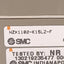 Used SMC NZX1102-K15LZ-F Vacuum Ejector, 30-80psi Supply, 25inHg, 1/8NTPF, 24VDC Coil