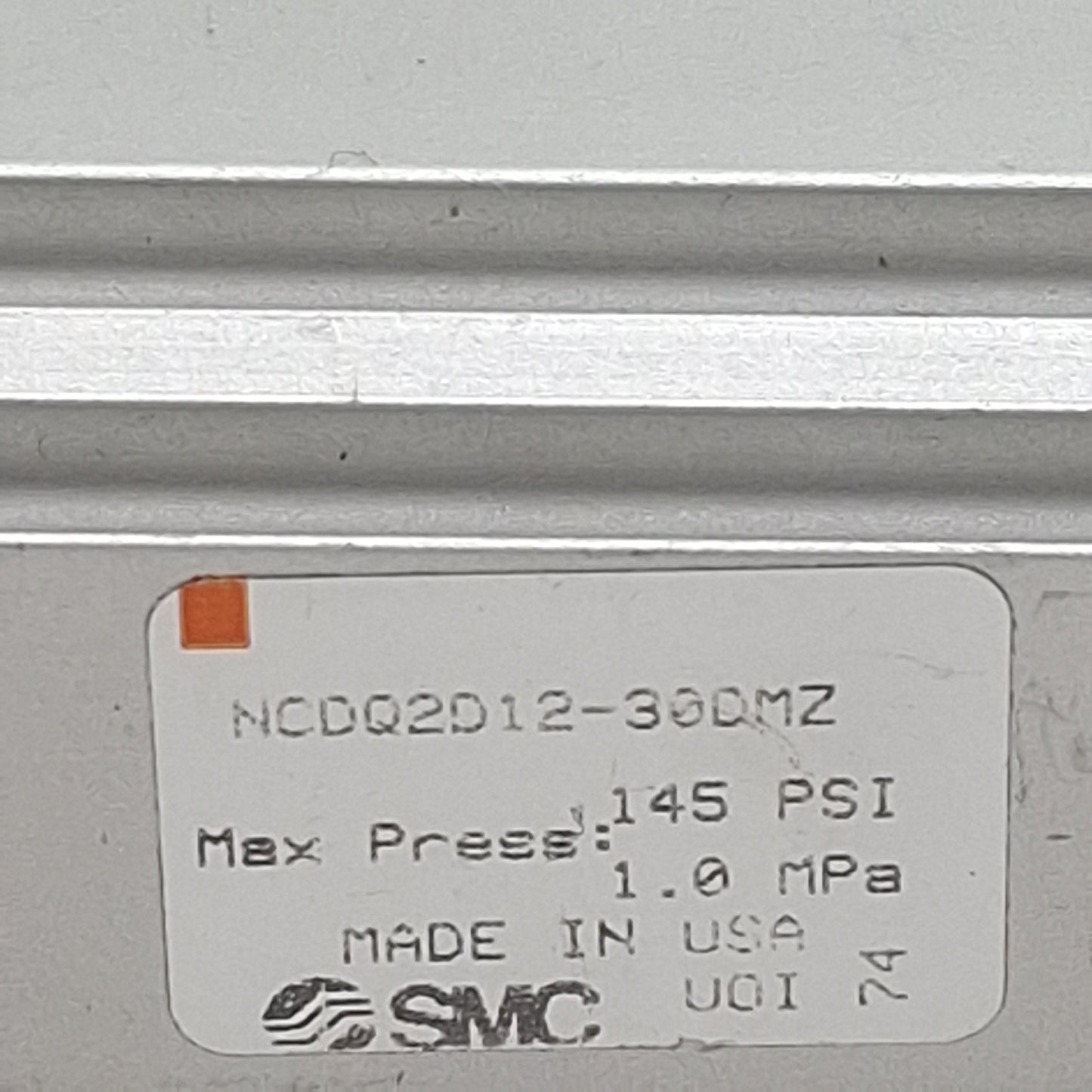 Used SMC NCDQ2D12-30MZ Compact Cylinder, ø12mm Bore, 30mm Stroke, M5 x 0.8, 145psi