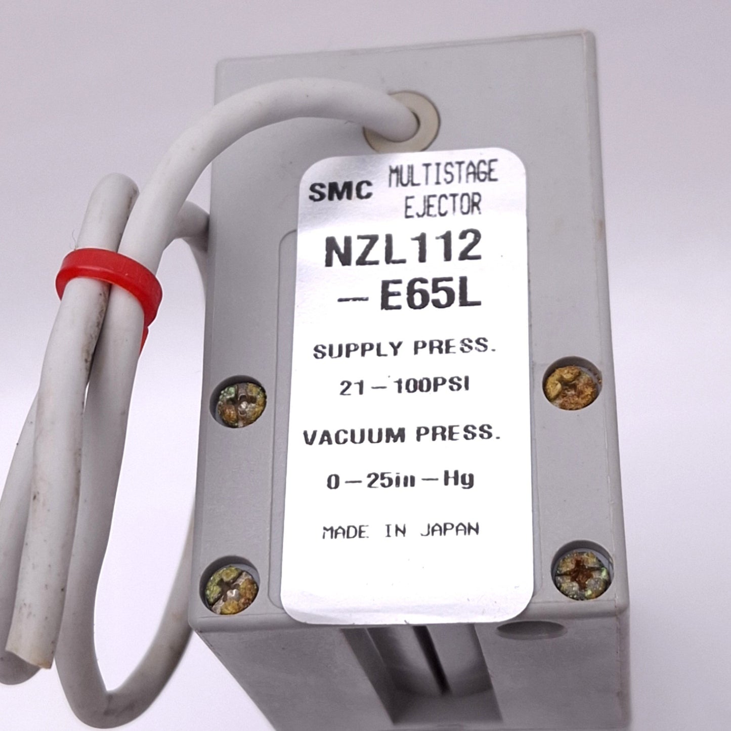Used SMC NZL112-E65L Multistage Ejector, 21-100psi In, 0-25inHg Vacuum, 1/2" 1/4" P2C