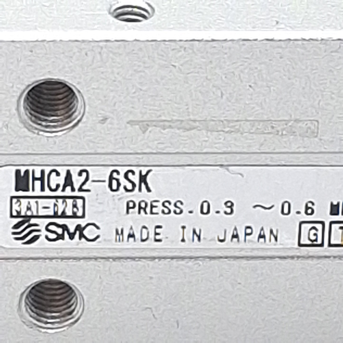 Used SMC MHCA2-6SK Pneumatic Parallel Gripper, ø6mm Bore, 30°~-10°, 0.024Nm, 0.6MPa