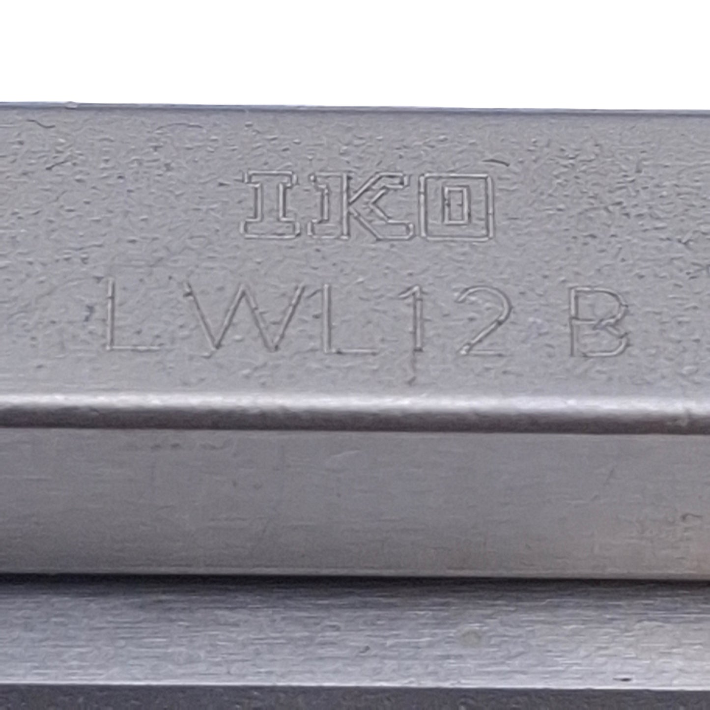 Used IKO LWL12B Linear Guide Block w/ 12x50mm Rail, 25mm Pitch, M3, 4290N Max