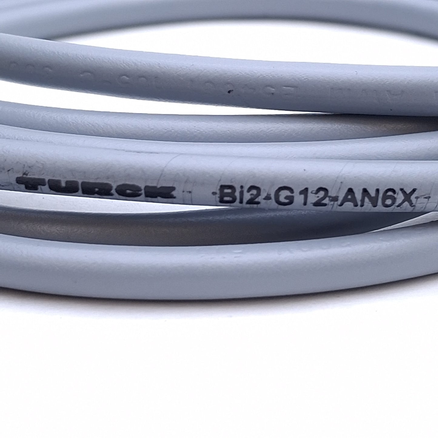 New Turck Bi2-G12-AN6X Proximity Sensor 2mm Range, 10-30VDC, M12 Barrel, 2m Cable