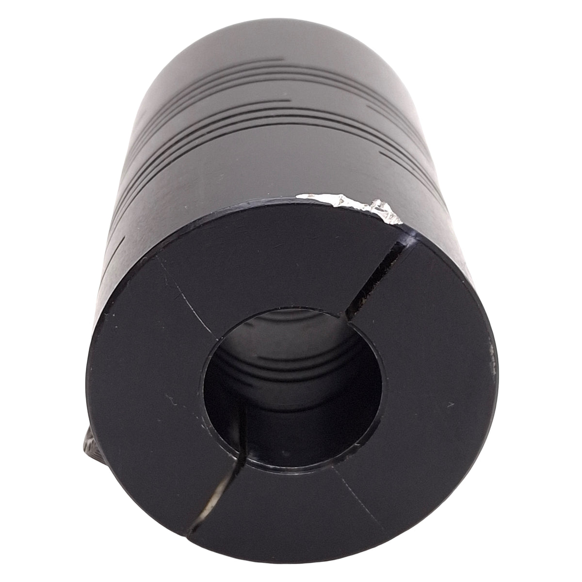 Used Ruland ROCMD44-19-19-AN Beam Coupling, ø19mm Bores, ø1.75in OD, 2.75in Length