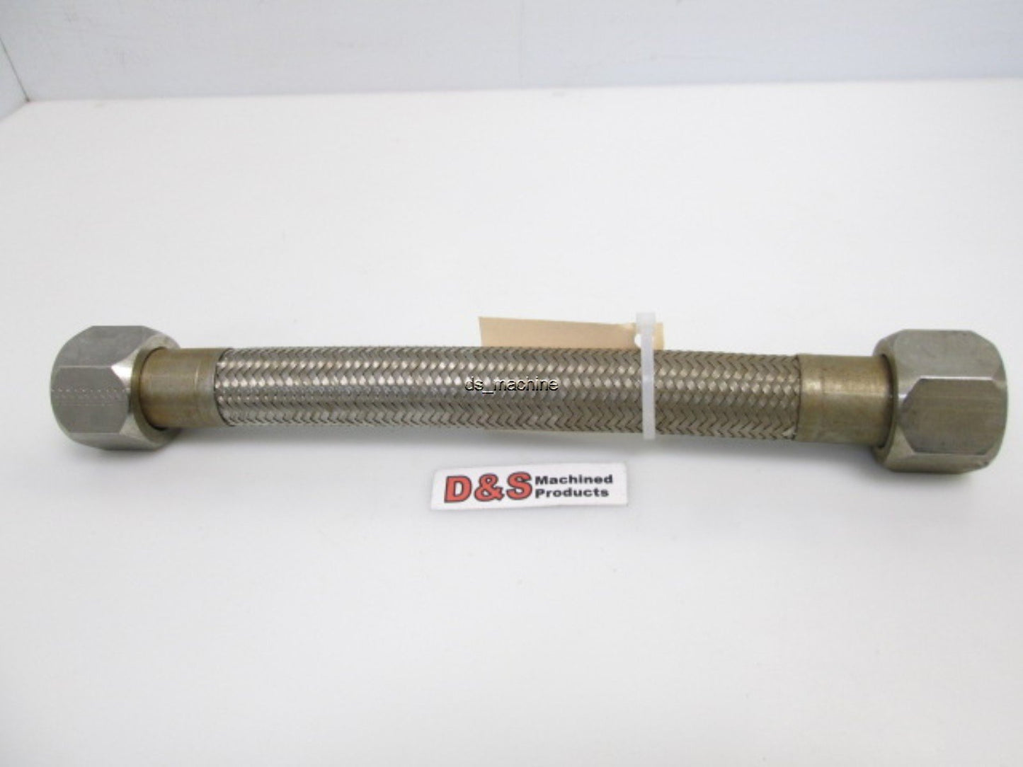Used Steel Braided Hose 1" Flare Ends, 10"(L) - slight discoloration