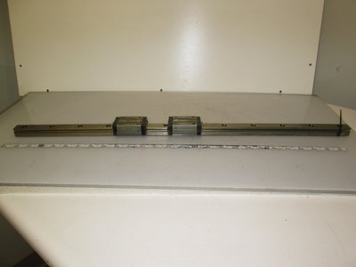 Used NSK LY200700AL2W04P4Z0 Linear Rail with 2x 79-024 Carriages 700mm Rail Length