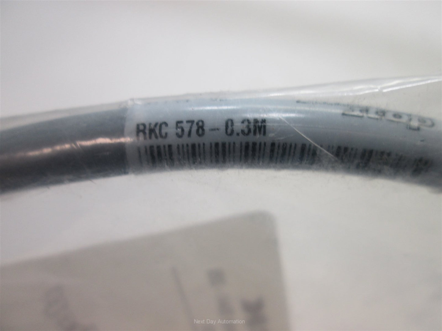 New Turck RKC 578-0.3M Cordset, 0.3 Meters Long, Rated: 250V 4A Max