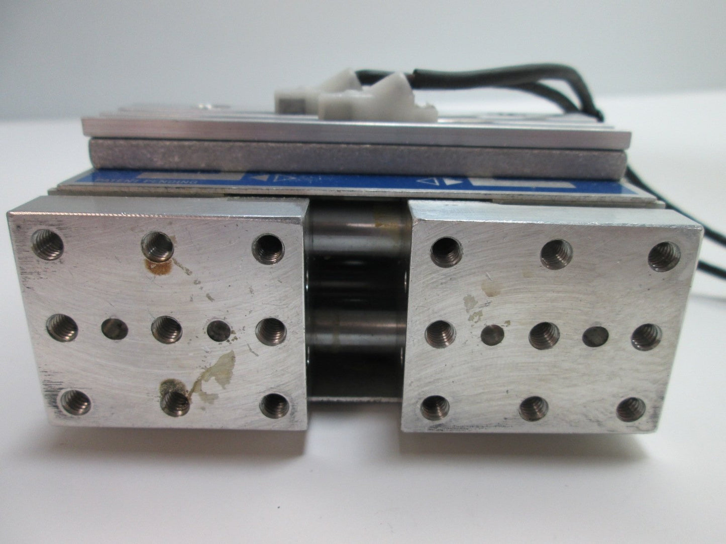 Used Fabco-Air SPG300-J2-E24C-A-V Parallel Gripper, 22 lbf, 0.54" Stroke, w/ Sensors