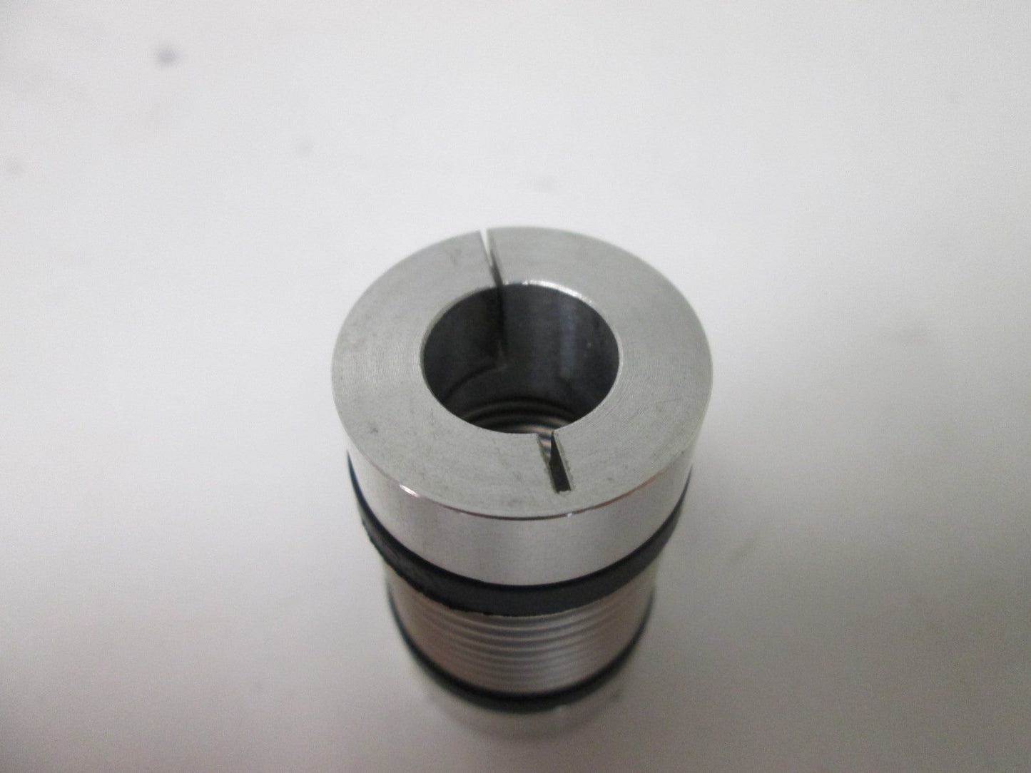 Used RW Bellows Coupling, 6mm ID to 0.5" ID, Dimensions: 25mm OD x 44mm Long