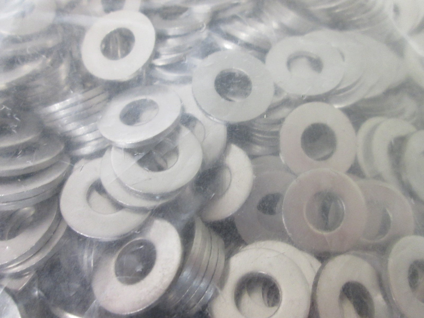 New Lot of 2000 Washers, Size: 5/16", Outside Diameter: 0.7", Thickness: 0.06"