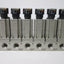 Used Bank of 6 SMC ARM1000 Manifold Regulators, With 0-150psi Gauge, 1/8" Ports