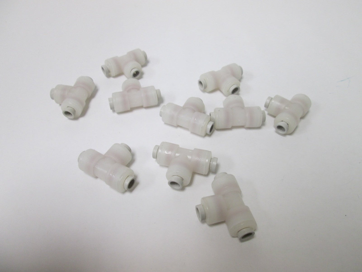 Used Lot of 10 Parker F4TU4 Parflex Tee Fittings, For 1/4" Tubing, Pressure: 300psi