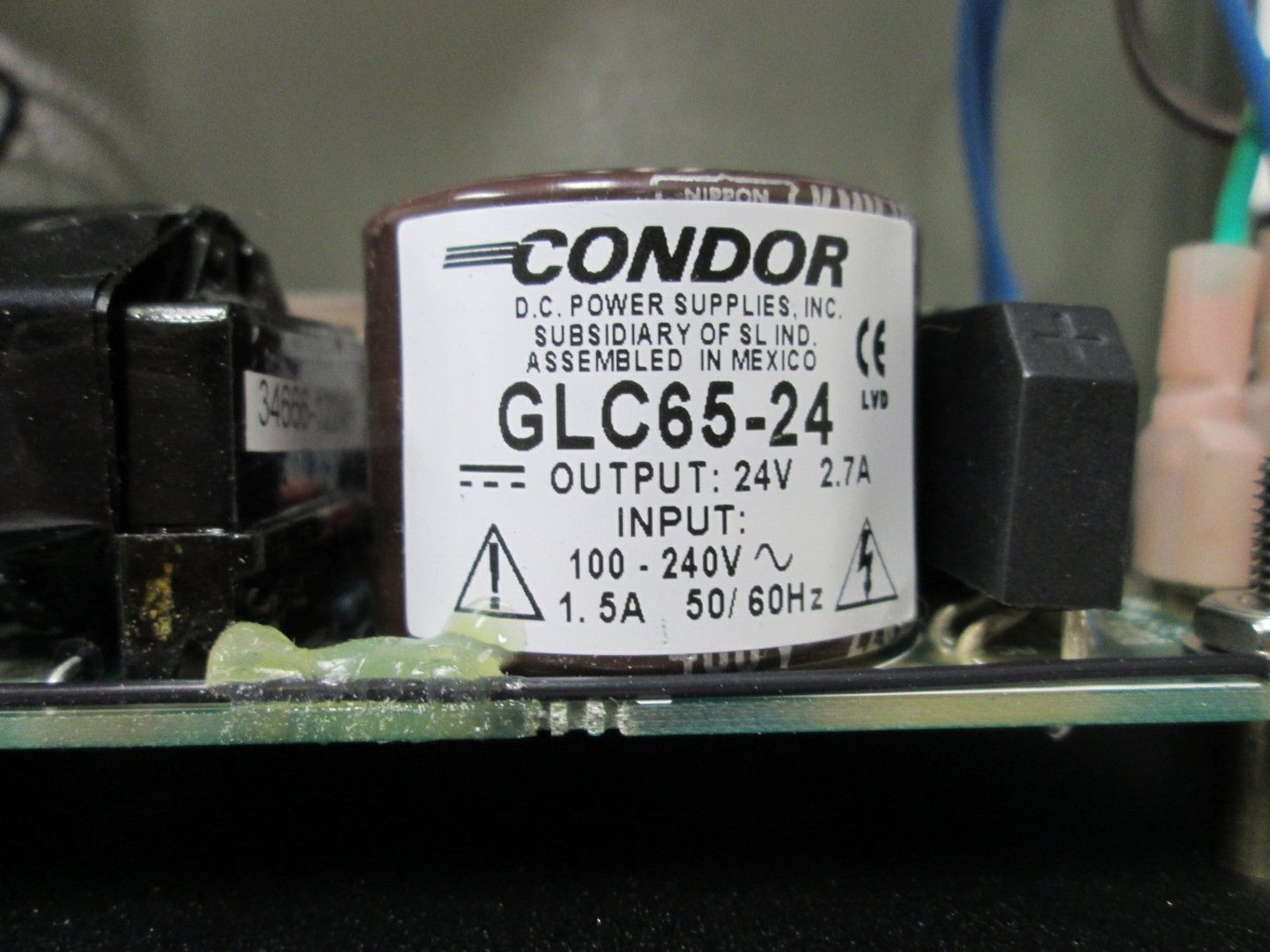 Used Condor GLC65-24 Power Supply Inside Housing, Output: 24VDC 2.7A, In: 90-264VAC